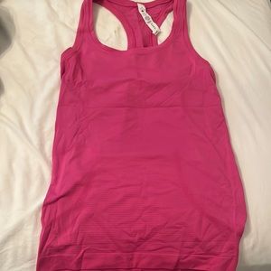Lululemon swiftly teck tank in color ripen raspberry